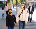 portrait of caucasian girl and boy on street during epidemic Royalty Free Stock Photo