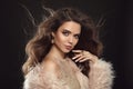 Brunette in fashion fur coat. Beauty portrait of gorgeous b Royalty Free Stock Photo