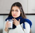 Brunette gargling throat with medicine Royalty Free Stock Photo