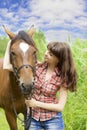 Brunette girl with horse