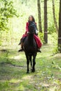 Brunette girl on horse Royalty Free Stock Photo