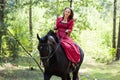 Brunette girl on horse Royalty Free Stock Photo