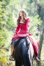 Brunette girl on horse Royalty Free Stock Photo