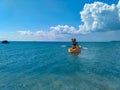 Brunette girl kayaking through lover`s key kayak trail Royalty Free Stock Photo