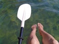 Brunette girl kayaking through lover`s key kayak trail