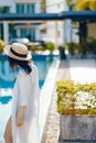 Brunette girl relaxing at the pool Royalty Free Stock Photo