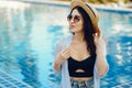 Brunette girl relaxing at the pool Royalty Free Stock Photo