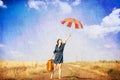 Brunette girl with suitcase Royalty Free Stock Photo