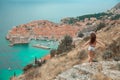 Brunette Girl tourist visiting mountain viewpoint sightseeing i Royalty Free Stock Photo