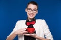 Brunette in glasses with a cup in his hands Royalty Free Stock Photo