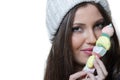 Brunette lady holding a candy skewer