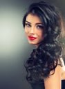 Brunette with long,dense curly hair. Royalty Free Stock Photo