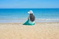 Brunette with long hair turned away and sitting Royalty Free Stock Photo