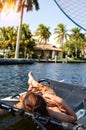 girl lying in a sailing catamaran