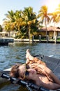 girl lying in a sailing catamaran