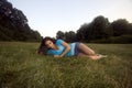 Brunette in meadow