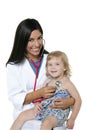 Brunette pediatric doctor with blond little girl