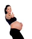 Brunette pregnant woman saying Ok Royalty Free Stock Photo