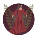 Brunette in red dress with two twigs and a burgundy circle behind her Royalty Free Stock Photo