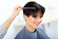 Brunette with Short Hair in Hair Salon.