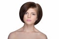 Brunette with short hair looking at camera on white isolated