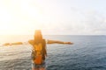 Brunette sitting on sea pier Royalty Free Stock Photo