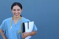 Brunette spanish doctor woman with a clipboard on blue background Royalty Free Stock Photo