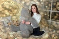 Brunette teen girl with big gray bear