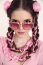 Brunette teen girl with two french braids from pink kanekalon, f Royalty Free Stock Photo