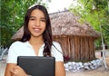 Brunette teen student indian latin holding laptop