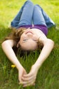 Brunette teenager girl smile on meadow Royalty Free Stock Photo