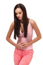 Brunette teenager has period cramps Royalty Free Stock Photo