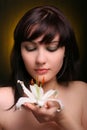 Brunette with white lily flowers