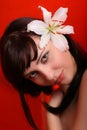Brunette with white lily flowers Royalty Free Stock Photo