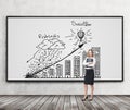 A brunette woman in formal clothes holds a black folder and presents ' Problems and solution ' strategy with the graph on th Royalty Free Stock Photo