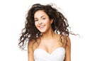 Brunette Woman with Long Wavy Hair. Beautiful Happy Smiling Girl Portrait, Curly Hairstyle on White Royalty Free Stock Photo