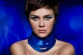 Brunette woman portrait with blue makeup Royalty Free Stock Photo