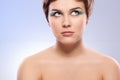 Brunette woman portrait with blue makeup Royalty Free Stock Photo