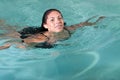 Brunette woman swimming Royalty Free Stock Photo