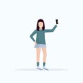 Brunette woman taking selfie photo on smartphone camera casual female cartoon character posing white background flat