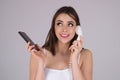 Brunette woman talking on retro telephone. Retro landline telephone. Beautiful sensual young woman talking on a landline Royalty Free Stock Photo