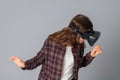 Brunette woman testing virtual reality helmet Royalty Free Stock Photo