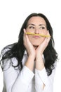 Brunette woman thinking with pencil Royalty Free Stock Photo