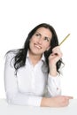 Brunette woman thinking with pencil Royalty Free Stock Photo