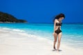 Brunette Woman On Tropical Beach. Summer vacation. Happy girl wa Royalty Free Stock Photo