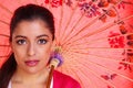 Brunette woman woth chinese umbrella Royalty Free Stock Photo