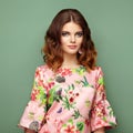 Brunette young woman in floral spring summer dress Royalty Free Stock Photo