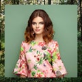 Brunette young woman in floral spring summer dress Royalty Free Stock Photo