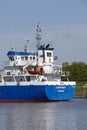 Brunsbuettel - Container vessel at arrival of lockage Royalty Free Stock Photo