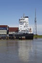 Brunsbuettel - Container vessel at lockage Royalty Free Stock Photo